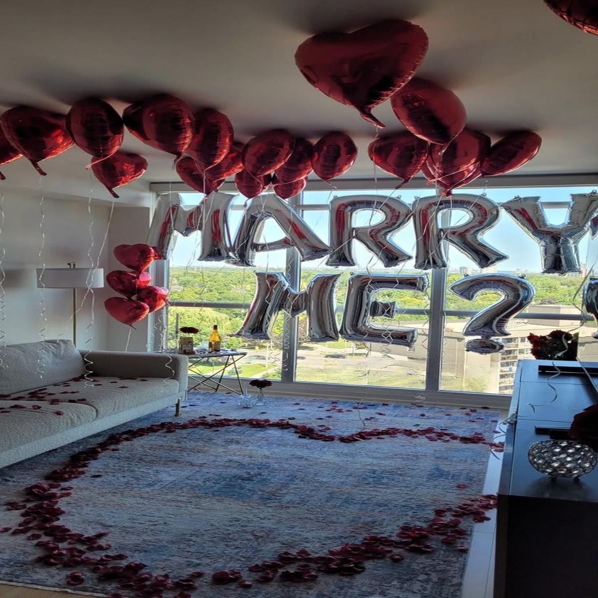 Artificial Flowers and Petals, Candles, Hearts Helium Bunch and Ceiling with Balloon Letters Helium