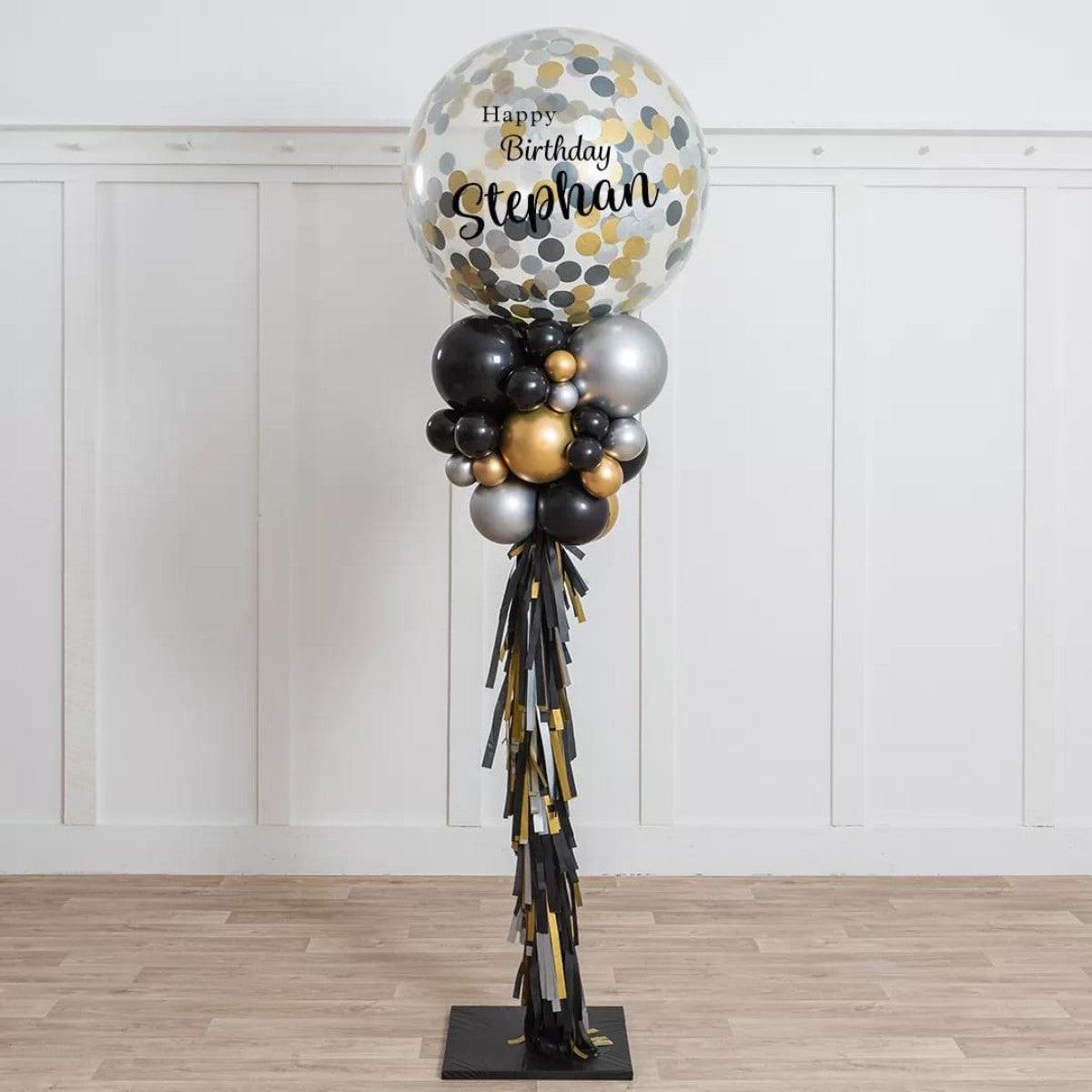 Personalised Clear Balloon with Black, Gold and Silver Confetti and Balloon with Tassels Accents Pi